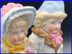 Antique German Hand Painted Bisque Porcelain Figurines Boy & Girl Holding Doll