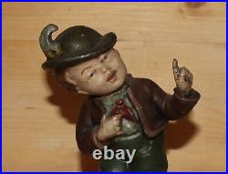 Antique German hand made metal figurine boy with Bavarian folk costume